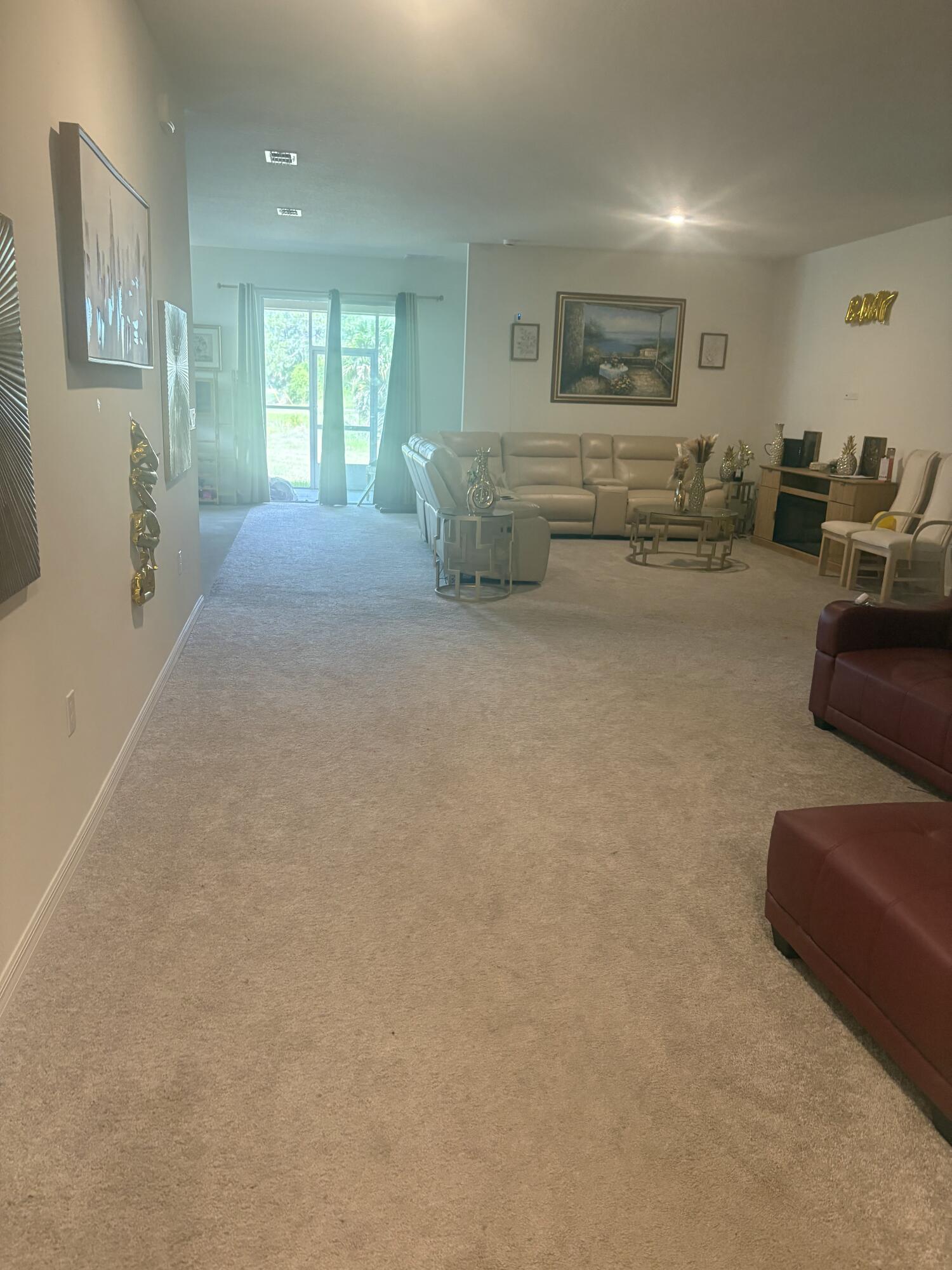 3982 Southwest Halcomb Street Port St. Lucie, FL 34953 - Photo 2 of 3 JOSEPH LIVINGROOM