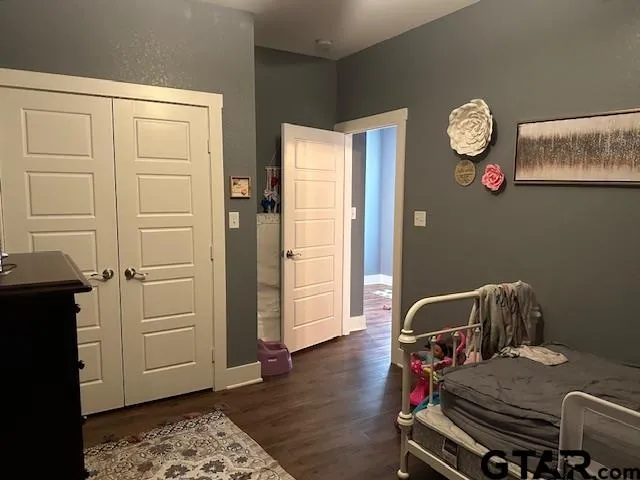a view of a livingroom with furniture and wooden floor