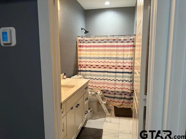 a view of a projector and an empty room