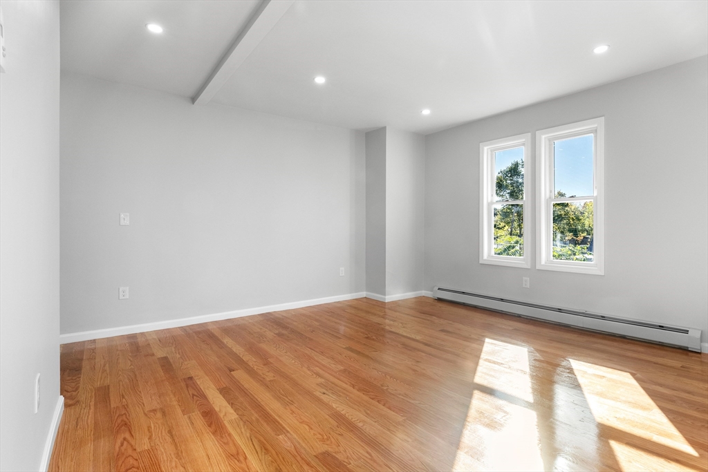 68 Middlebury Street Lawrence, MA 01841 - Photo 25 of 41 an empty room with windows