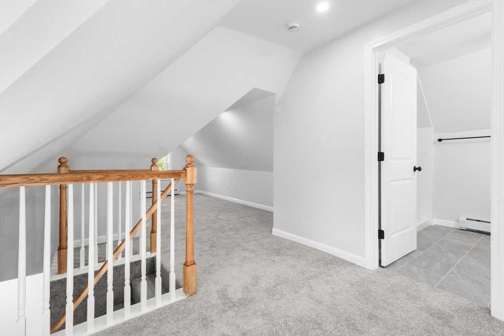 68 Middlebury Street Lawrence, MA 01841 - Photo 32 of 41 a view of a hallway to rooms