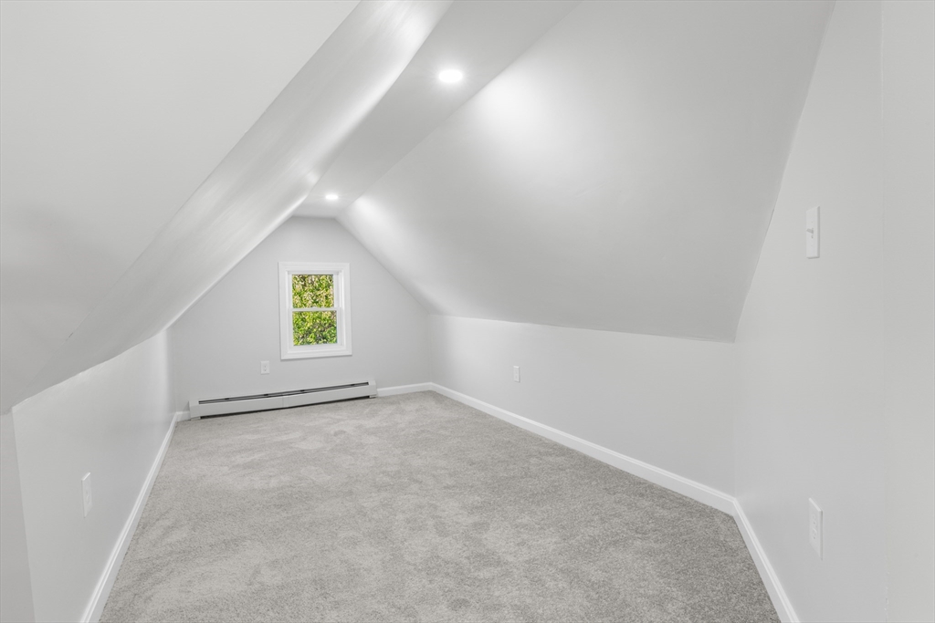 68 Middlebury Street Lawrence, MA 01841 - Photo 36 of 41 an empty room with windows and entrance