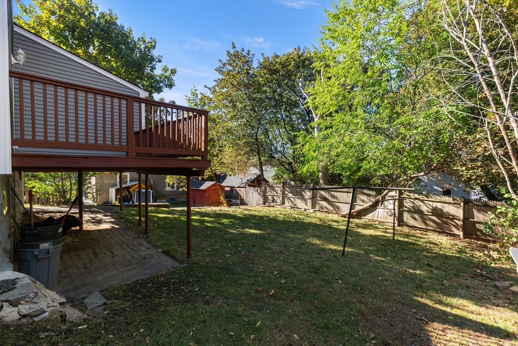 68 Middlebury Street Lawrence, MA 01841 - Photo 41 of 41 a view of a chair and table in the backyard