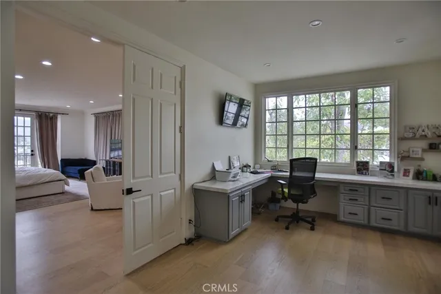 a view of a hallway with windows