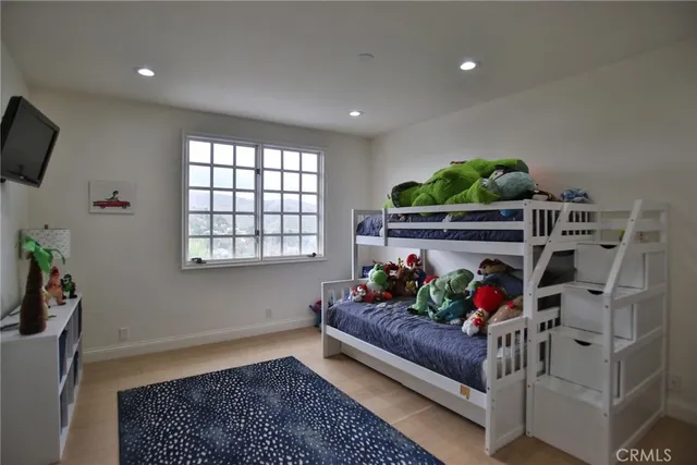 a bathroom with a sink a vanity and a mirror