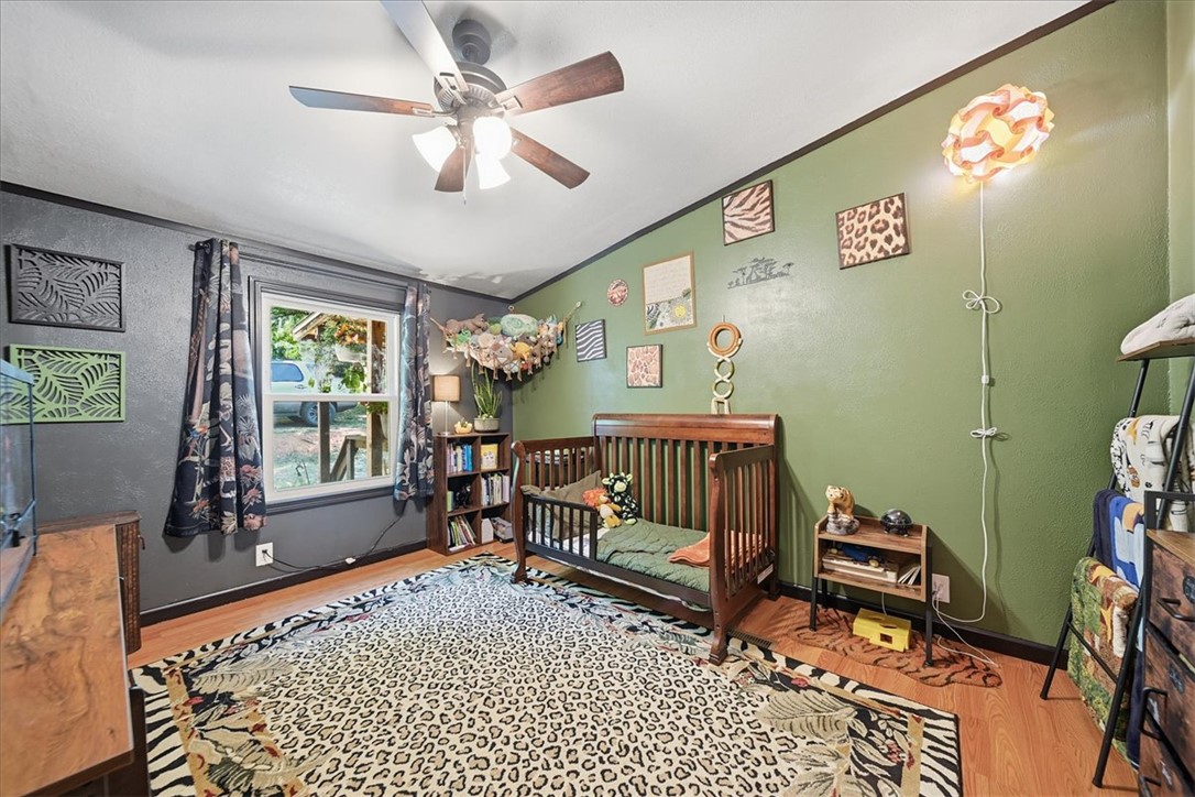 1014 Harris Road Anderson, SC 29625 - Photo 21 of 34 Hardwood floors and a window offer a bright, inviting space.