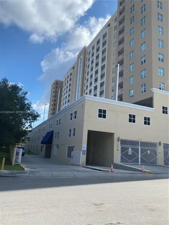a view of a building with a street