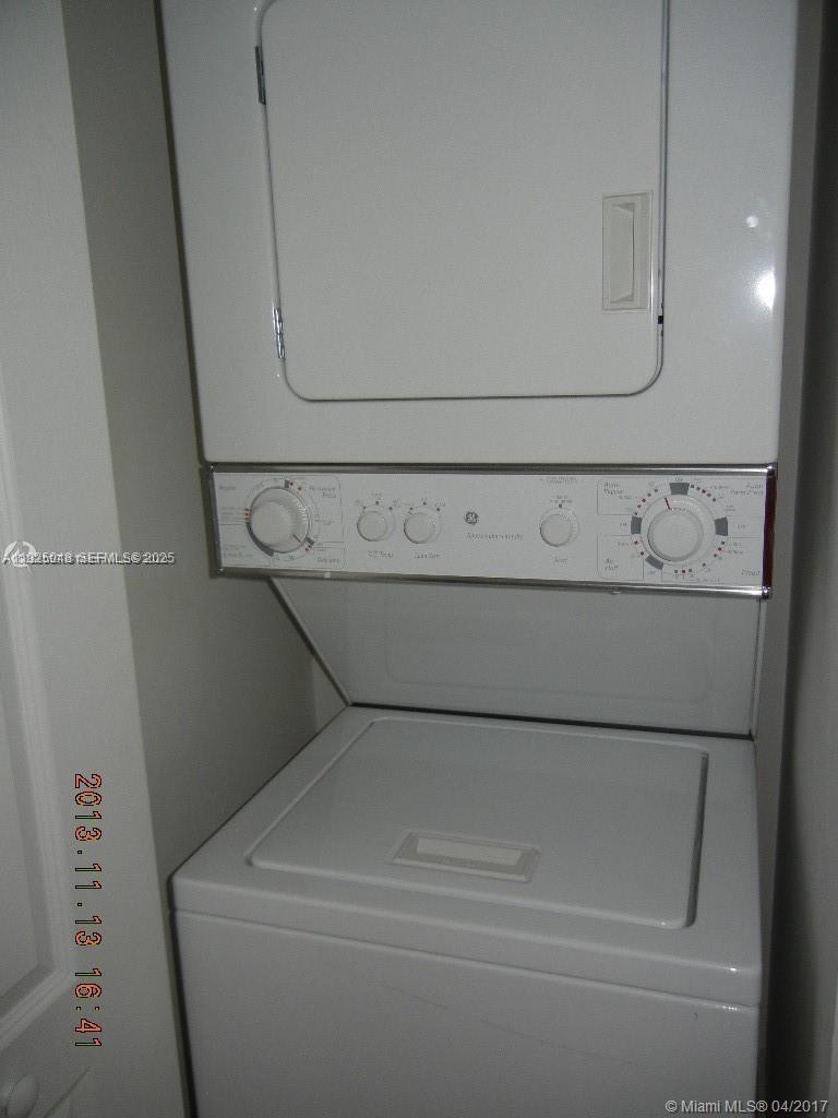 117 Northwest 42nd Avenue, Unit 800 Miami, FL 33126 - Photo 7 of 13 a close up view of washer and dryer