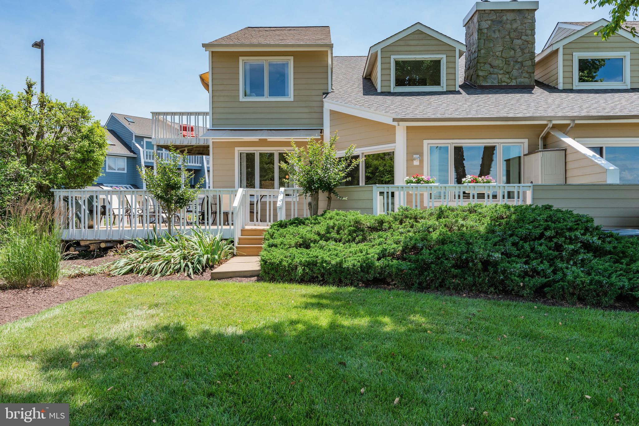 118 Bay View Grasonville, MD 21638 - Photo 6 of 42 View of Rear of TH with Expansive Wrap Around Deck