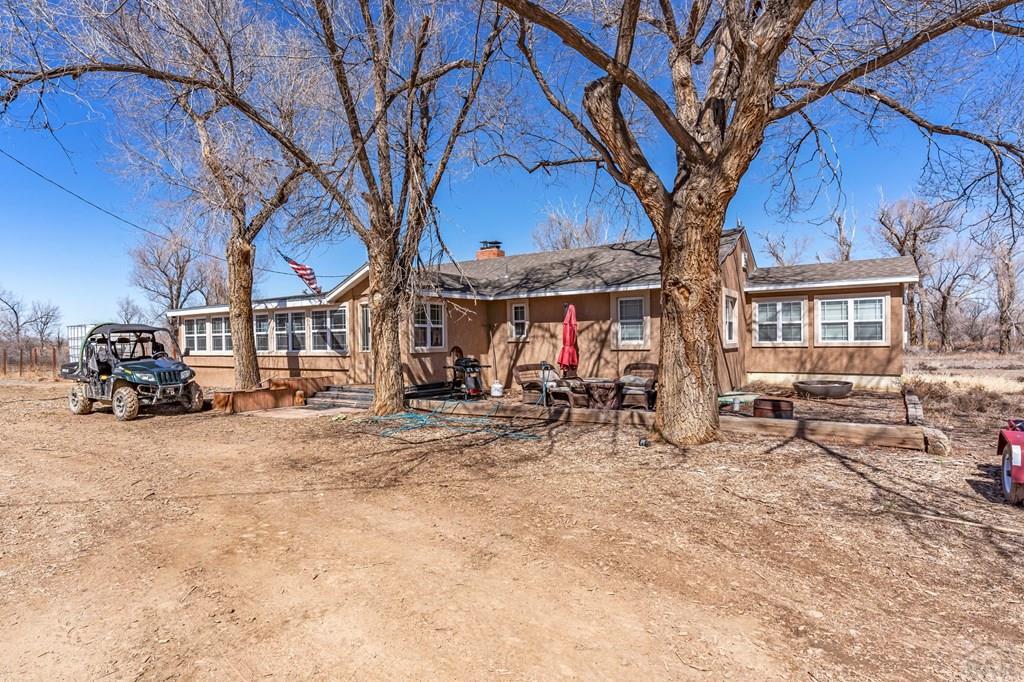 6597 County Lane 14 Ordway, CO 81063 - Photo 1 of 66 a view of a house with a patio