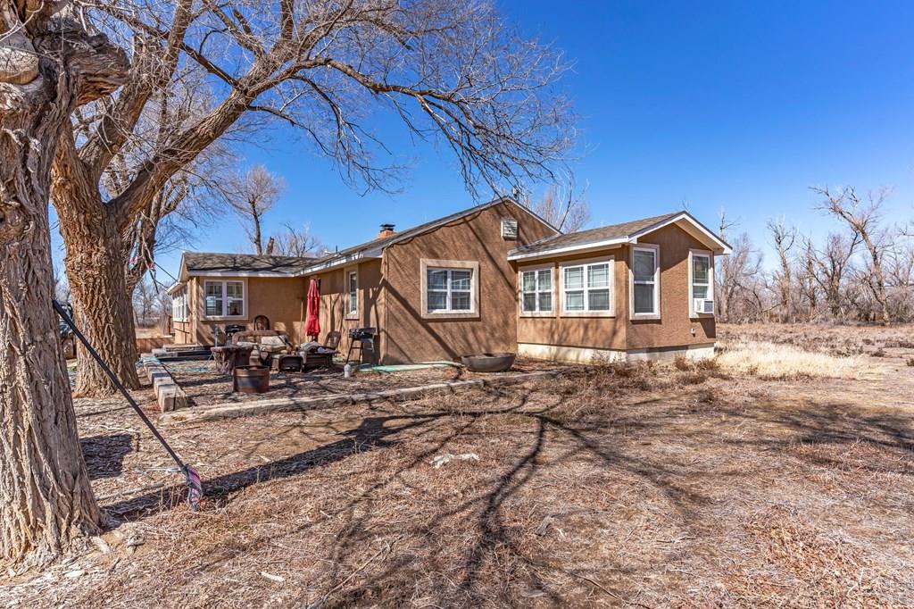 6597 County Lane 14 Ordway, CO 81063 - Photo 2 of 66 a view of house with a yard