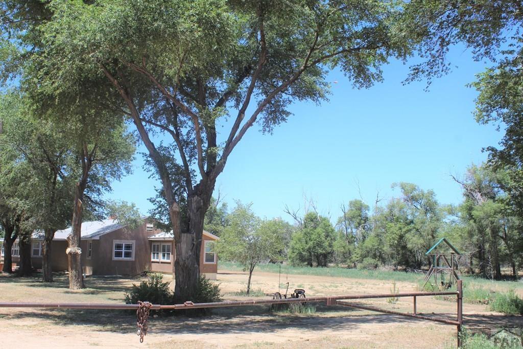 6597 County Lane 14 Ordway, CO 81063 - Photo 23 of 66 a view of a house with a yard