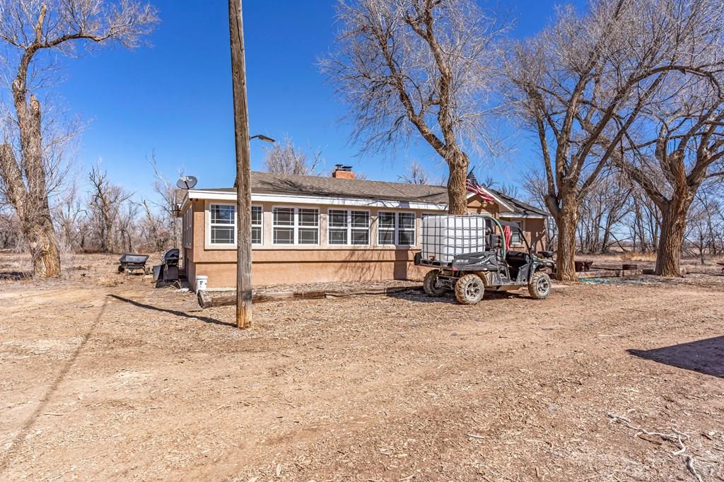 6597 County Lane 14 Ordway, CO 81063 - Photo 24 of 66 a view of a house with a yard covered in snow