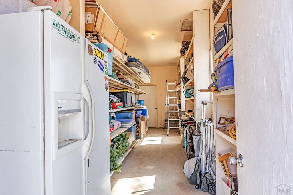 6597 County Lane 14 Ordway, CO 81063 - Photo 28 of 66 a view of walk in closet with clothes