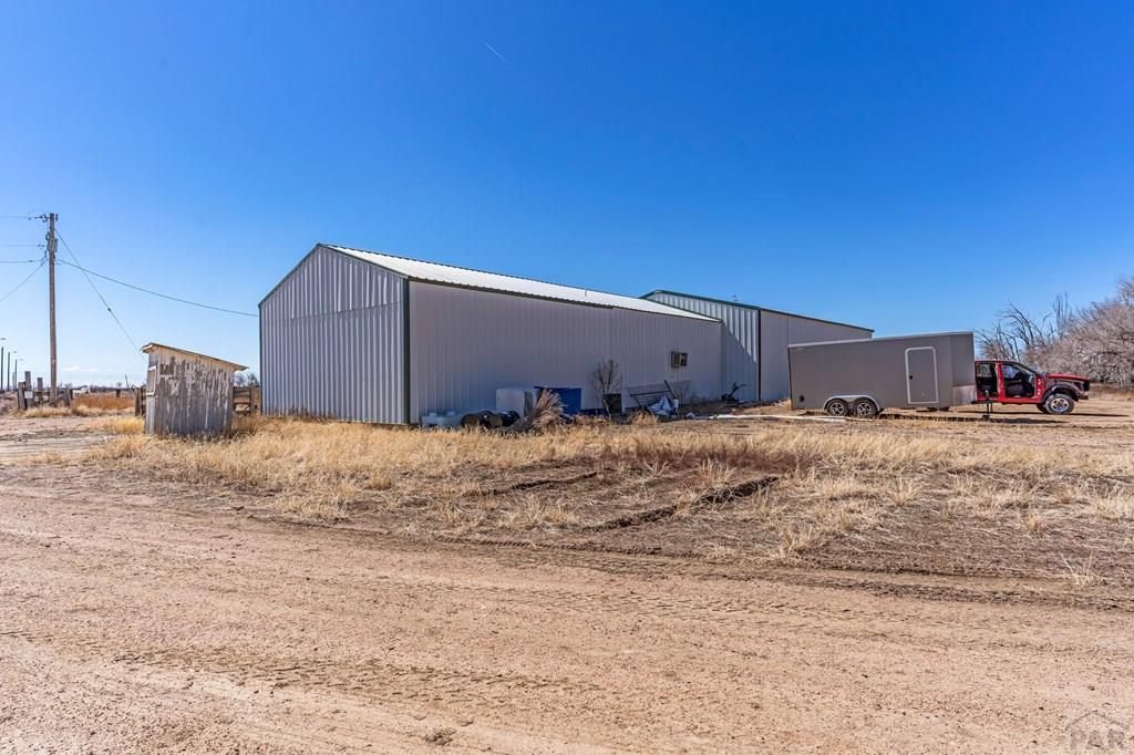 6597 County Lane 14 Ordway, CO 81063 - Photo 37 of 66 a view of a backyard of the house