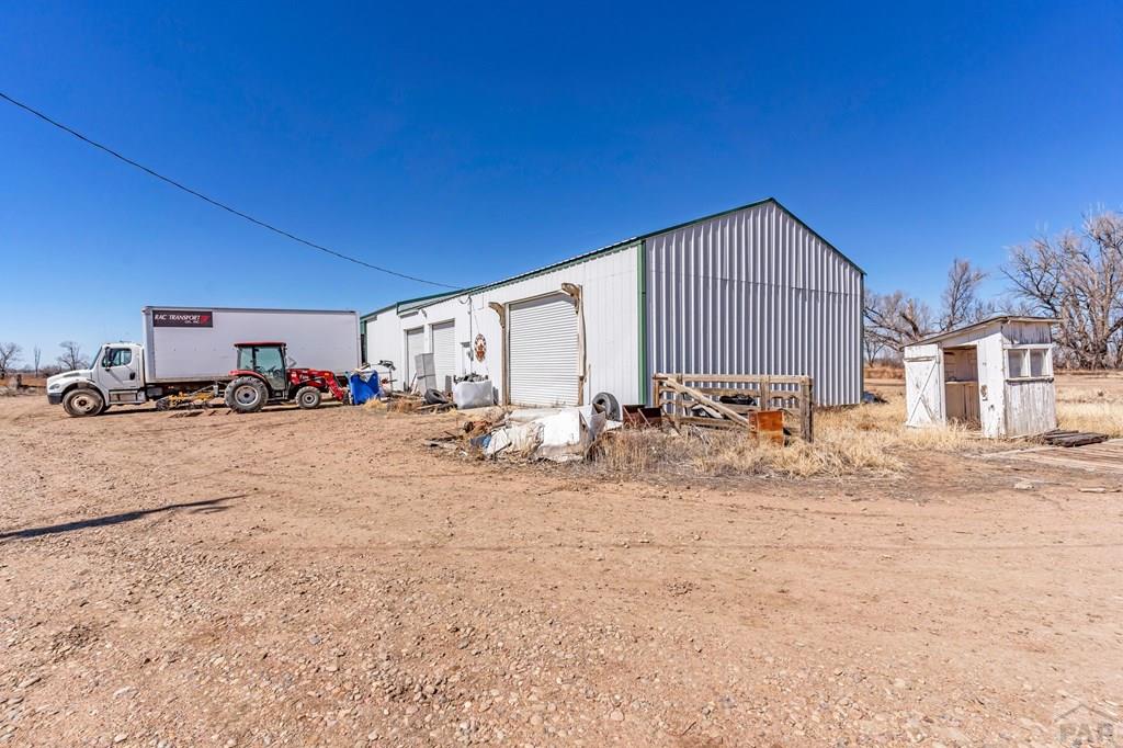 6597 County Lane 14 Ordway, CO 81063 - Photo 39 of 66 a view of a backyard of a house