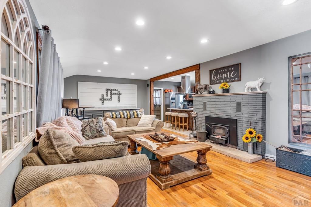 6597 County Lane 14 Ordway, CO 81063 - Photo 4 of 66 a living room with furniture and a fireplace