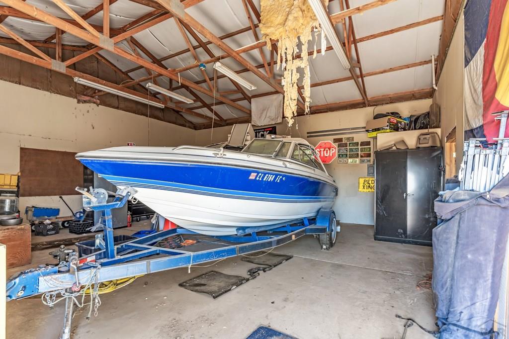 6597 County Lane 14 Ordway, CO 81063 - Photo 43 of 66 a room with storage and racks