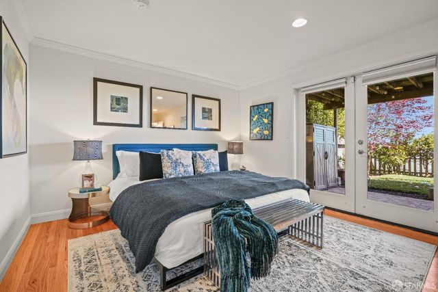 a aerial view of a house with a yard and a garden