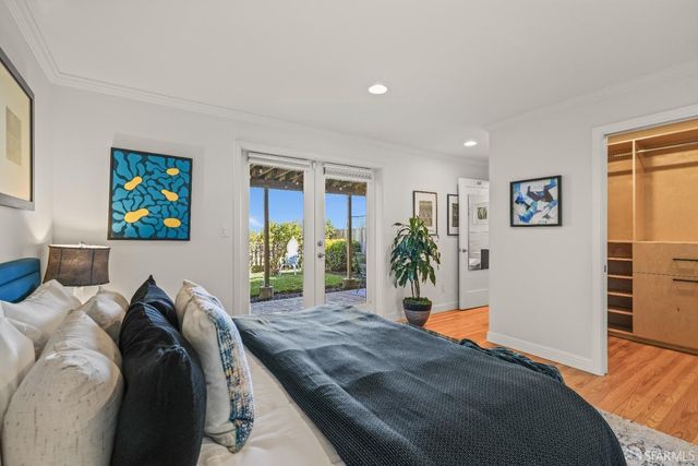 front view of a house with a garden