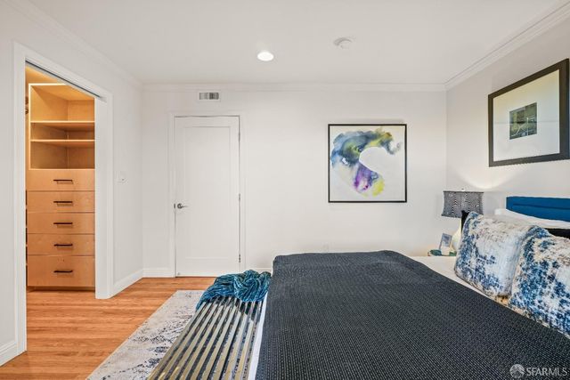 a view of a grassy area with an ocean