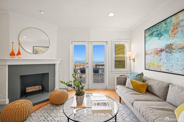 a view of a balcony with furniture