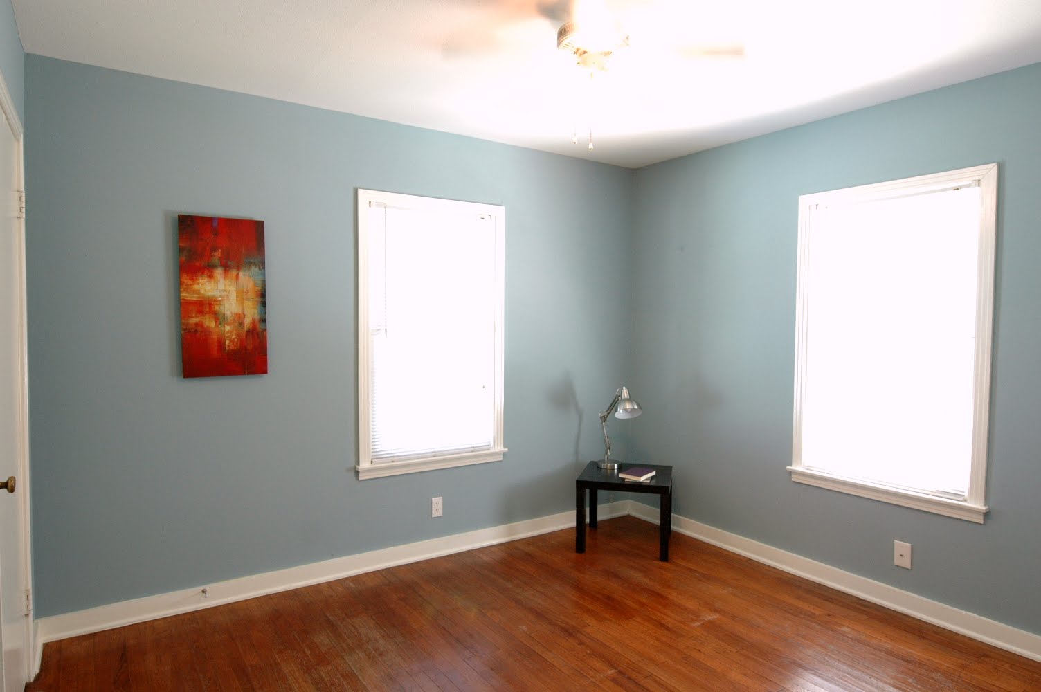 409 West Croslin Street Austin, TX 78752 - Photo 12 of 16 a view of an empty room with a window and wooden floor