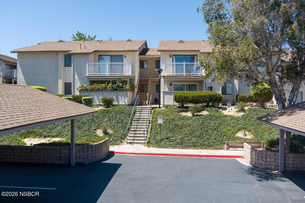 3400 Santa Maria Way, Unit 207B Santa Maria, CA 93455 - Photo 3 of 50 front view of a house with a yard