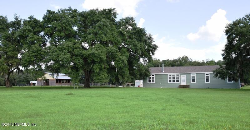 110 Jones Road Crescent City, FL 32112 - Photo 1 of 55 a view of house with a backyard
