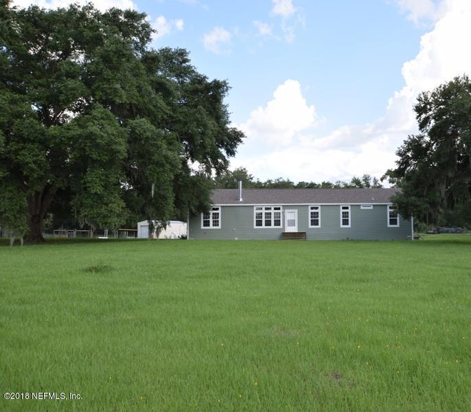 110 Jones Road Crescent City, FL 32112 - Photo 2 of 55 a view of a house with backyard and garden