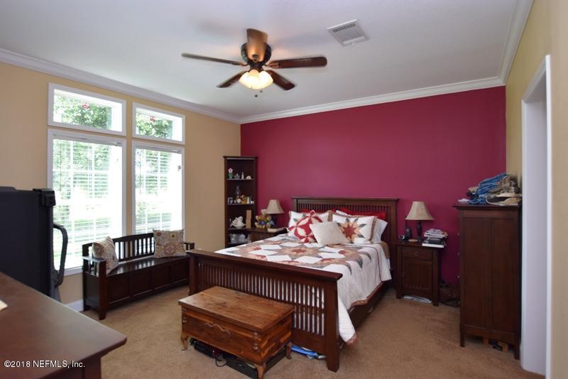 110 Jones Road Crescent City, FL 32112 - Photo 31 of 55 a bed room with a bed and a couch
