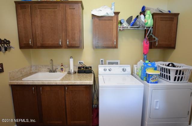 110 Jones Road Crescent City, FL 32112 - Photo 34 of 55 a utility room with dryer and washer