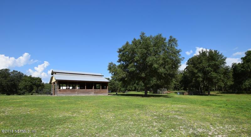 110 Jones Road Crescent City, FL 32112 - Photo 41 of 55 a view of a house with a big yard