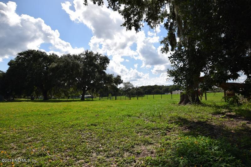 110 Jones Road Crescent City, FL 32112 - Photo 49 of 55 a view of a field of grass and trees