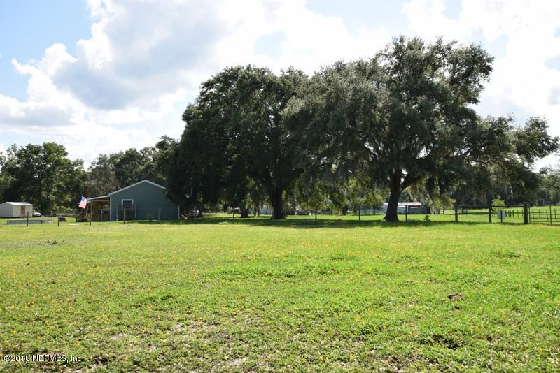 110 Jones Road Crescent City, FL 32112 - Photo 50 of 55 a backyard of a house with lots of green space