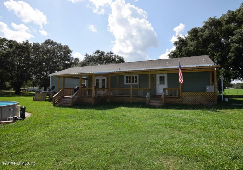 110 Jones Road Crescent City, FL 32112 - Photo 5 of 55 a view of house with a garden