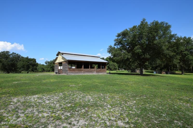 110 Jones Road Crescent City, FL 32112 - Photo 51 of 55 a front view of a house with a garden