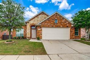 410 Dartmoor Drive Celina, TX 75009 - Photo 1 of 22 View of front facade with an attached garage, a front lawn, and driveway