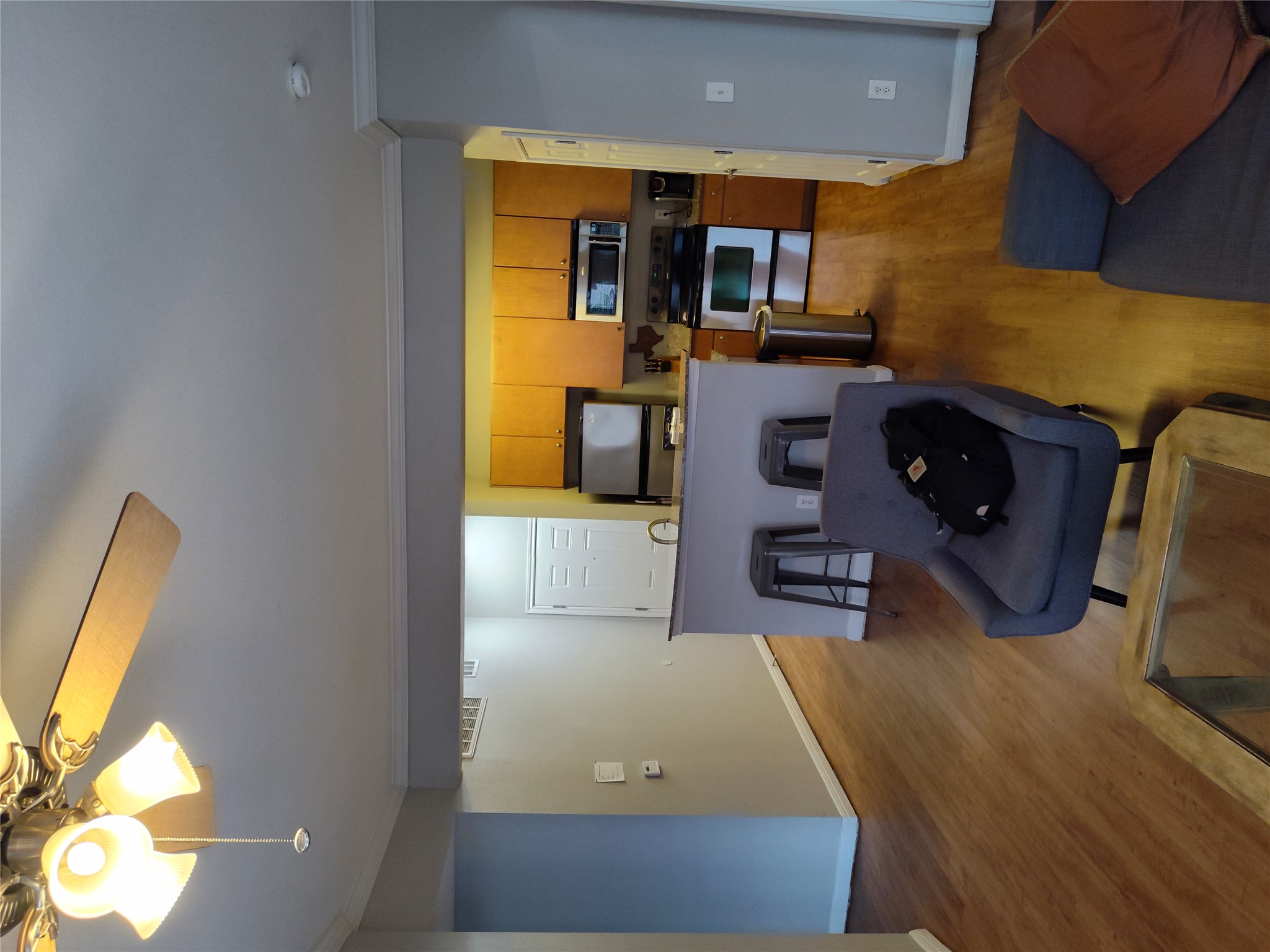 2502 Leon Street, Unit 304 Austin, TX 78705 - Photo 2 of 10 a living room with furniture and a flat screen tv