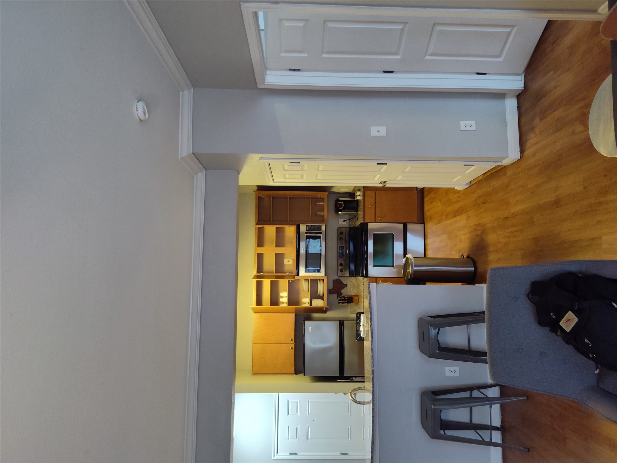 2502 Leon Street, Unit 304 Austin, TX 78705 - Photo 4 of 10 a living room with furniture and floor to ceiling window