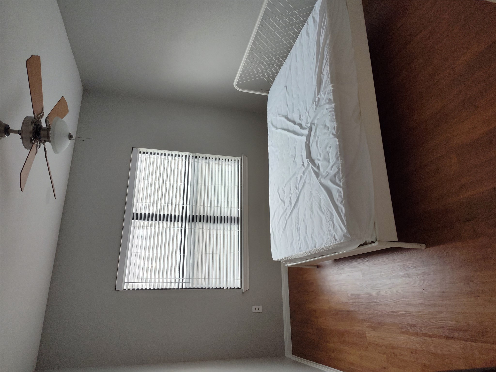 2502 Leon Street, Unit 304 Austin, TX 78705 - Photo 8 of 10 a bedroom with a bed and window