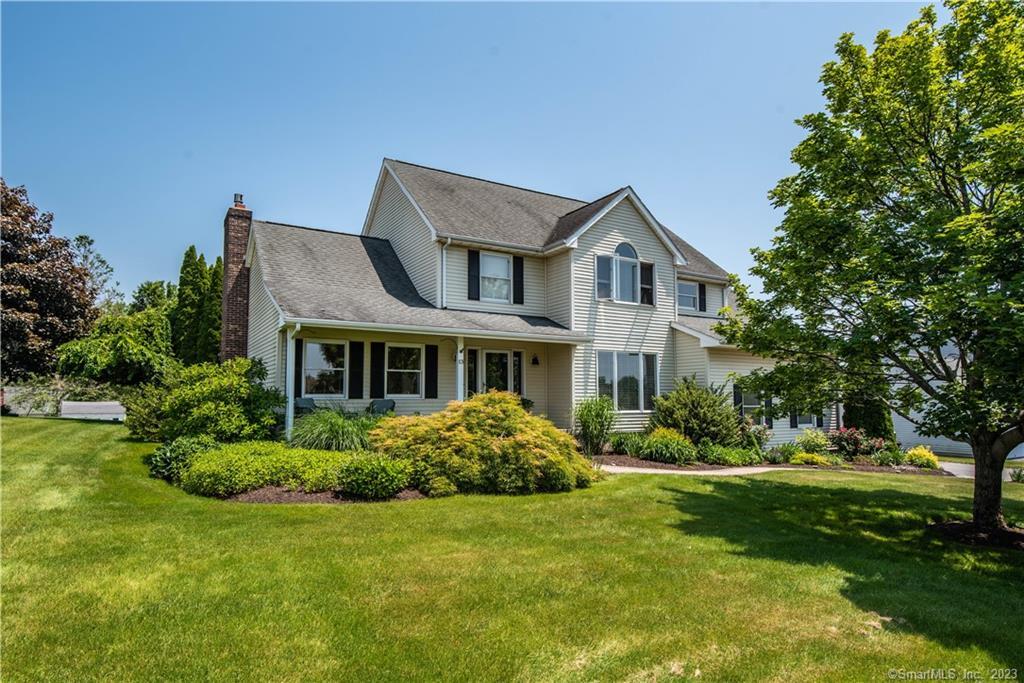 13 Meadow Road Cromwell, CT 06416 - Photo 1 of 1 a front view of house with yard and green space