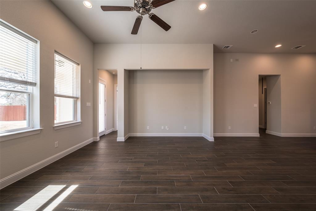 113 Old Trinity Way Georgetown, TX 78628 - Photo 9 of 27 Unfurnished room featuring recessed lighting, ceiling fan, and wood tiled floors