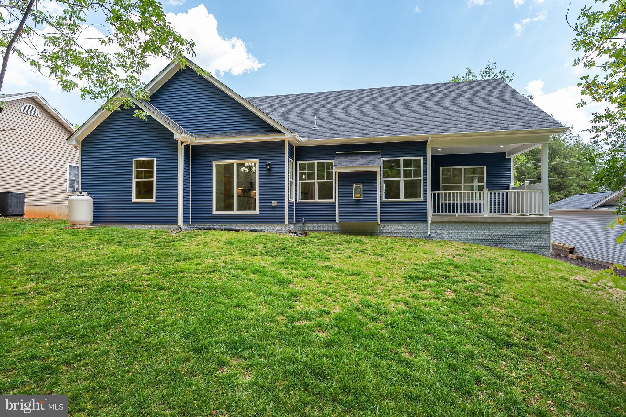 403 Harrison Circle Locust Grove, VA 22508 - Photo 46 of 48 The attached covered rear porch!