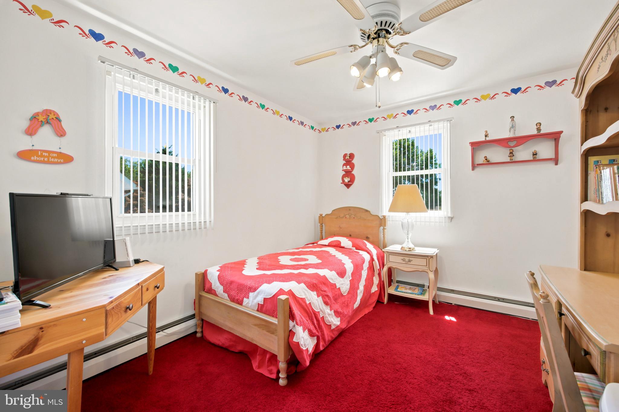 1004 Green Lane Secane, PA 19018 - Photo 27 of 49 a bedroom with furniture and a flat screen tv