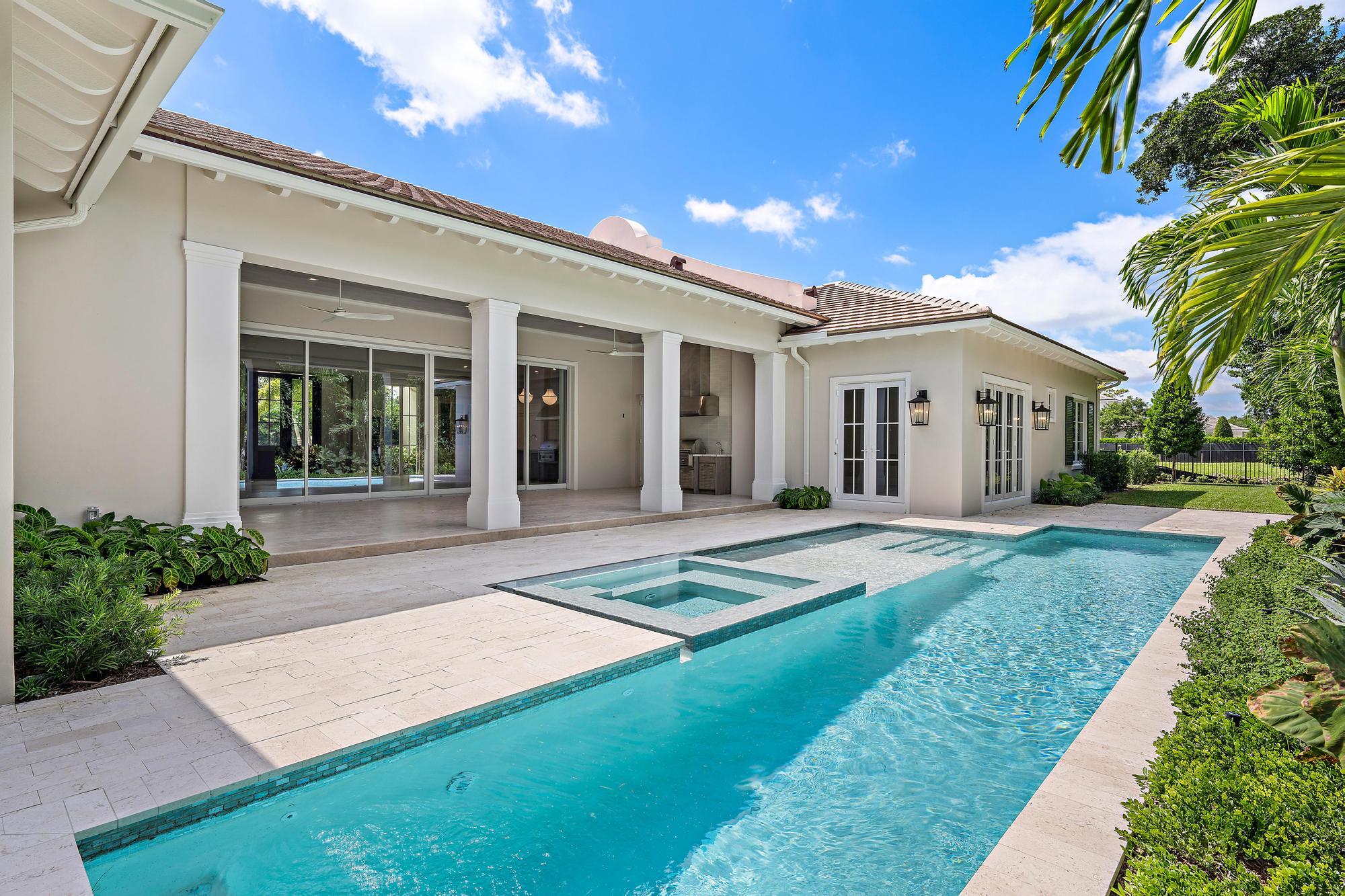 2917 Bluewater Cove Gulf Stream, FL 33483 - Photo 36 of 37 a view of a house with a patio