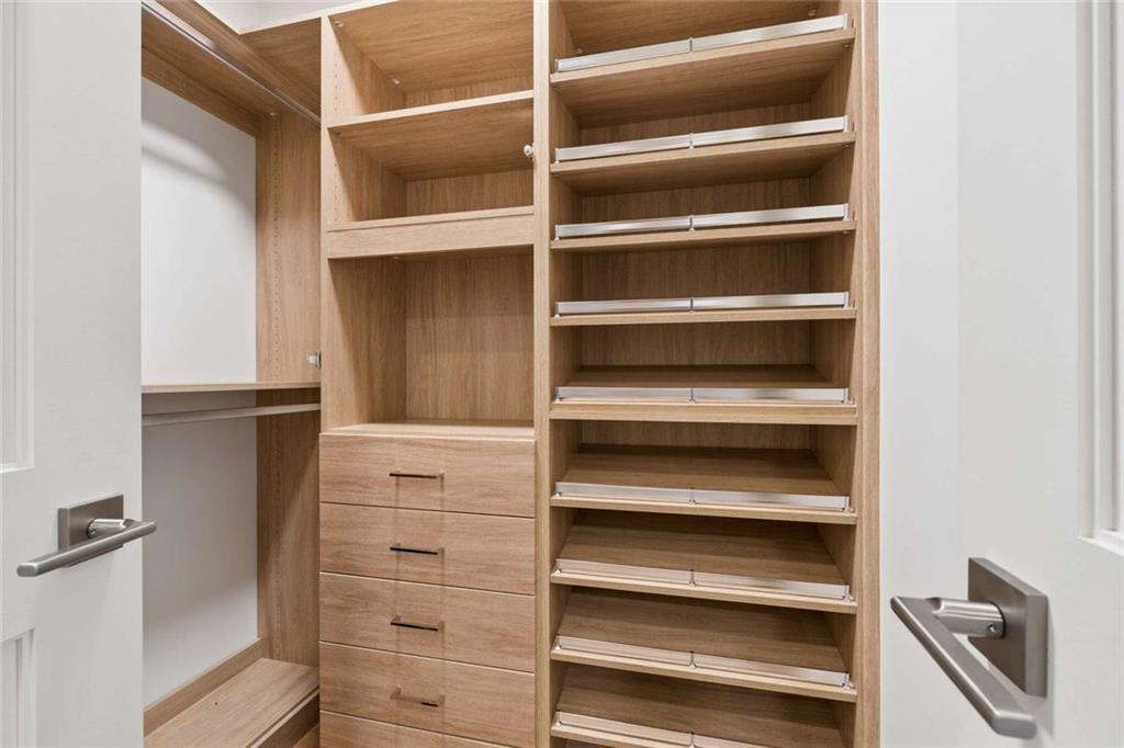 2520 Peachtree Road, Unit 603 Atlanta, GA 30305 - Photo 43 of 91 a view of walk in closet with empty racks