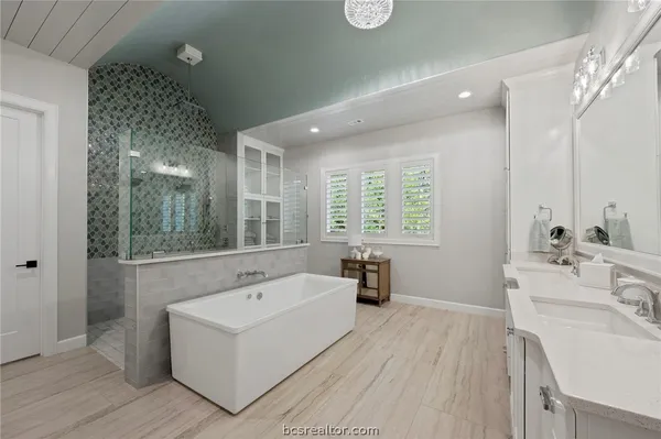 a bathroom with a sink and a bathtub