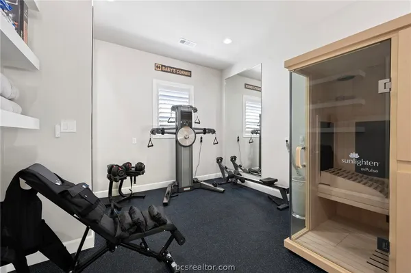 a view of a room with gym equipment