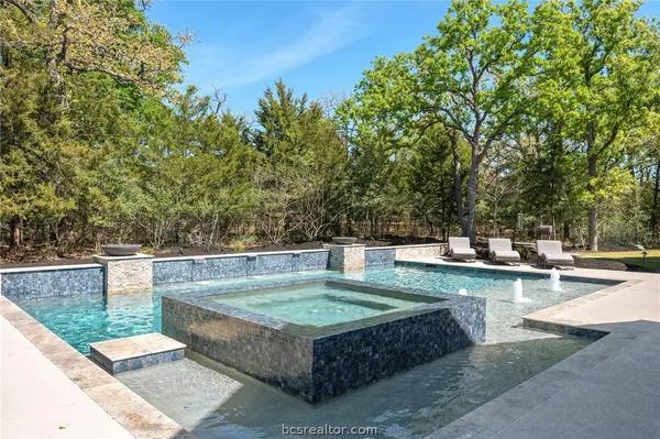 a view of a yard from a patio